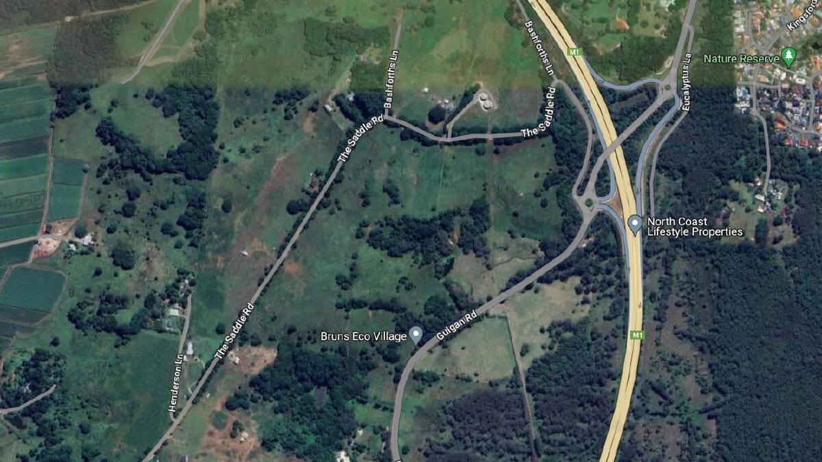 The proposed development is on Saddle Rd, on the western side of the Pacific Highway. Picture by Google Maps