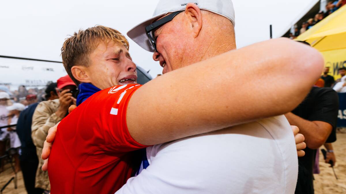 An emotional Mikey McDonagh embraces his father Tony after his breakthrough win. Picture by WSL/ Cait Miers.