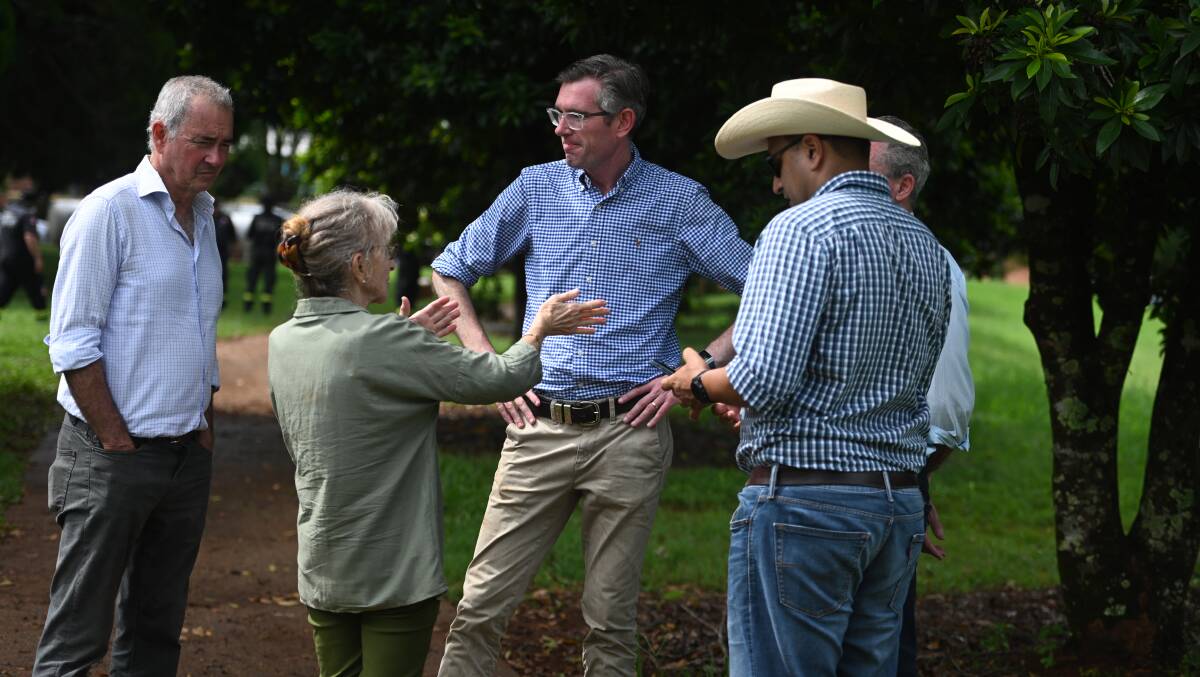 Lismore MP Janelle Saffin talks to NSW Premier Dominic Perrottet during a visit after the February 28 flood. Picture: Cathy Adams