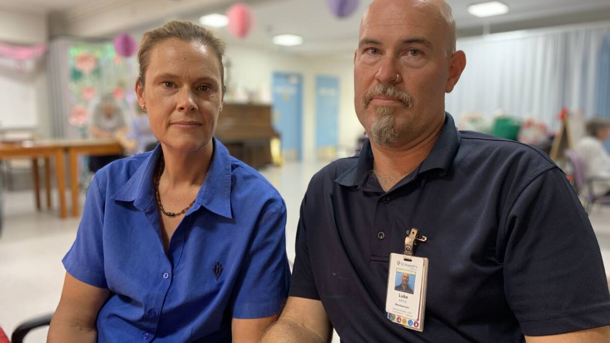 St Vincent's employees Elissa and Luke Virtue were badly impacted during Lismore's floods, but despite their hardship, they quickly returned to work to support their patients. Picture: Mark Bowling
