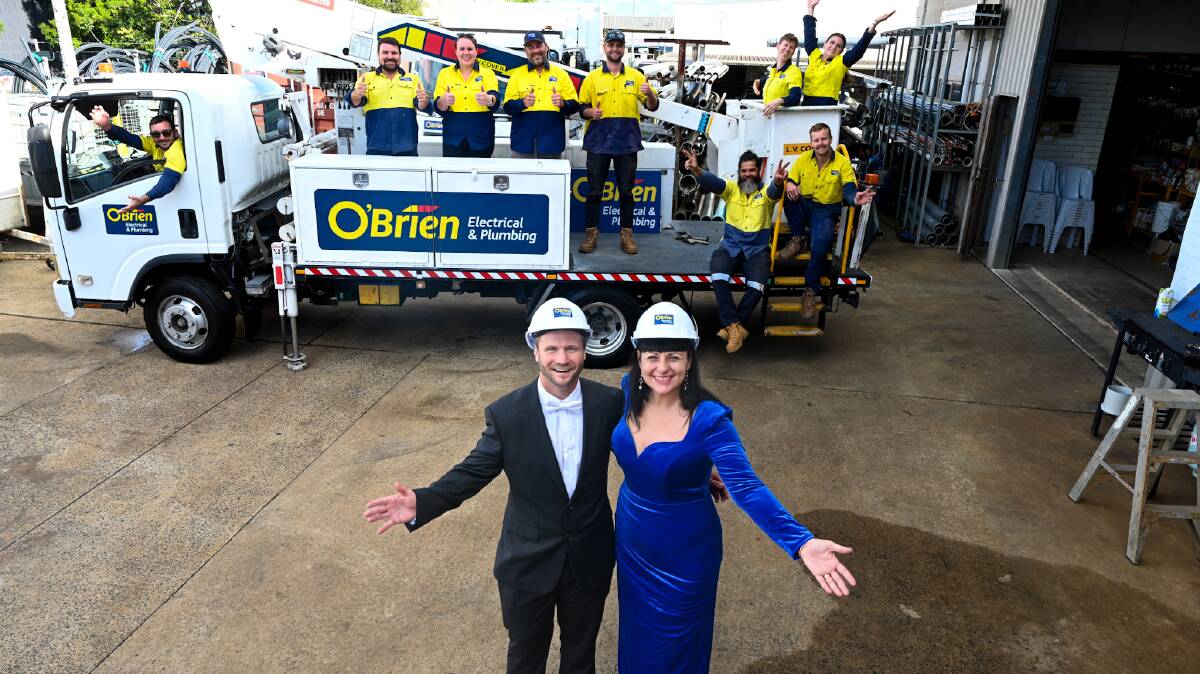 Managing Director of O'Briens Electrical and Plumbing Jake Campbell with Rebekka Battista fro Our Kids and the team from O'Briens. Picture by Cathy Adams