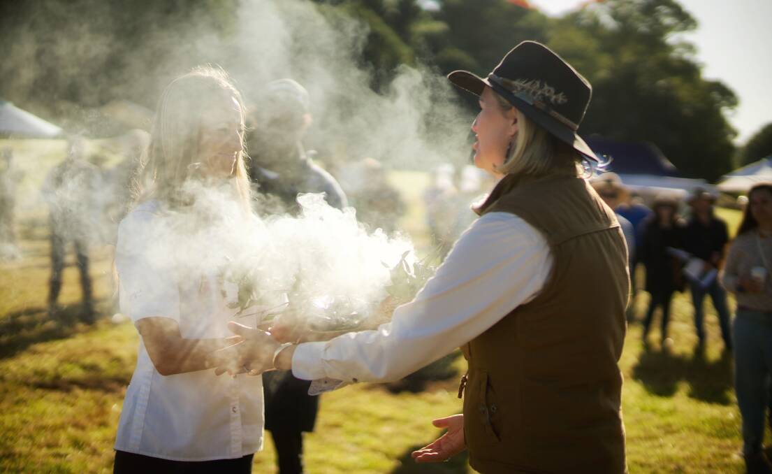 Smoking ceremony is Mindy Woods and Shae Bleakley. Picture by Alex Clarke