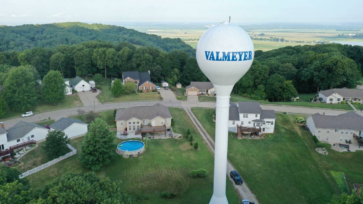 Current Village on higher ground. The flood plain area can be seen in the background,400 feet below the relocated town. Drone photo by village staff.