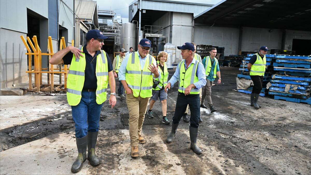 Former Prime Minister Scott Morrison visiting the Norco factory in south Lismore after the flood. Picture: Cathy Adams