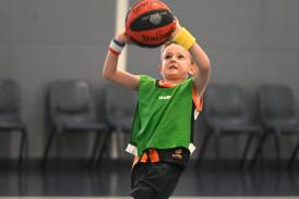 Hugo Turnbull takes a shot at Aussie Hoops. Picture by Cathy Adams
