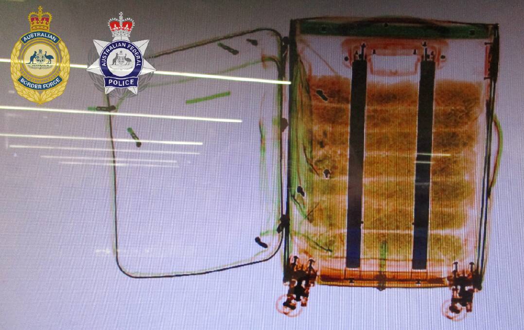 Suitcase allegedly containing three kilograms of methamphetamine. Picture via AFP