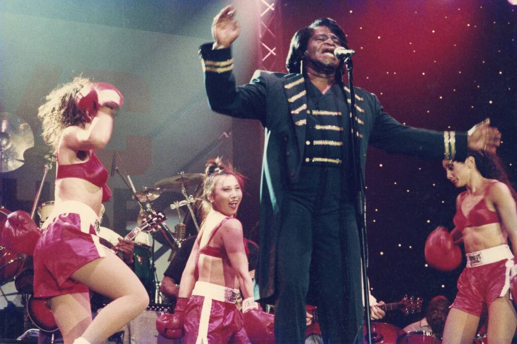 "The King of Funk" James Brown in concert in 1996. Picture by Robbie Drexhage, CC BY-SA 4.0, via Wikimedia Commons. 