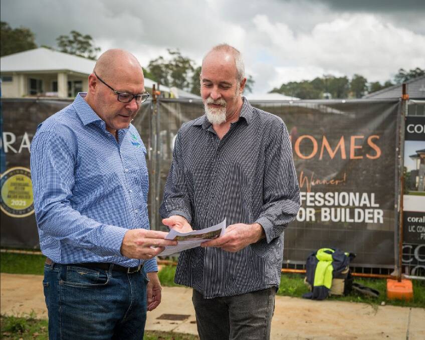 Lismore Mayor Steve Krieg discussing the Lismore Housing Expo with Council's Strategic Planning Coordinator Andy Parks.
