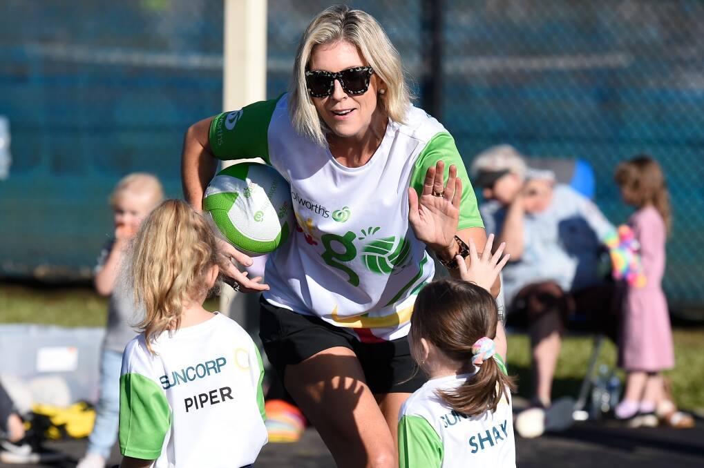 HIGH FIVE: Former Australian Diamonds netballer Cath Cox was in Lismore on the weekend as part of a fundraiser with the Woolworths NetSetGO program. Picture: Matt Roberts