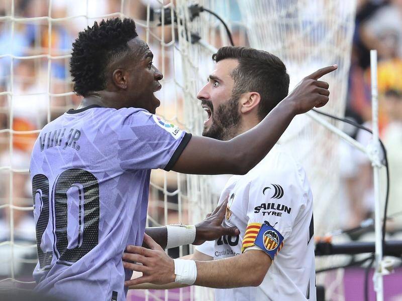 Real Madrid's Vinicius Junior gestures at Valencia fans, saying one racially insulted him. (AP PHOTO)