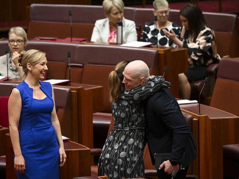 Senator David Pocock was congratulated after an initial vote on the territory rights bill. (Lukas Coch/AAP PHOTOS)