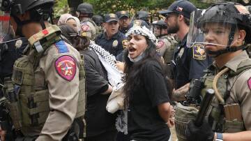 Riot police arrested students at a pro-Palestinian protest at the University of Texas. (AP PHOTO)