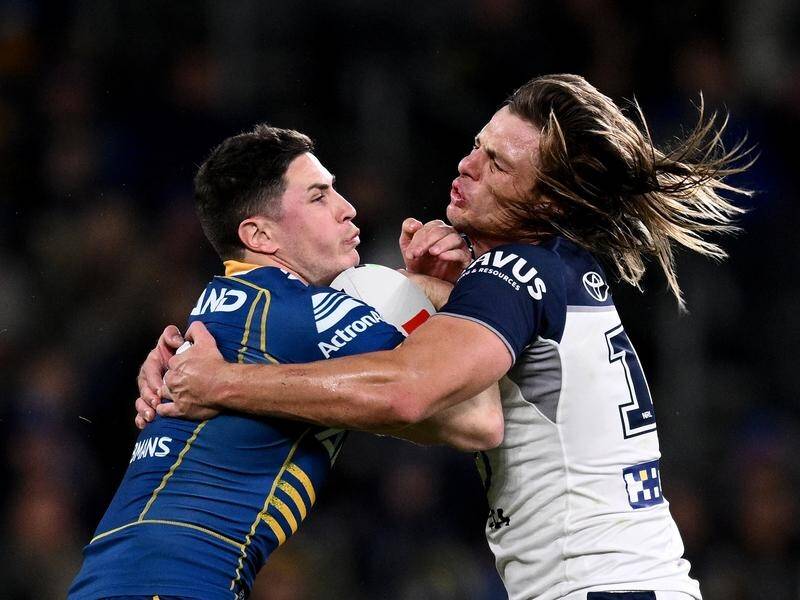 Mitchell Moses (left) has inspired Parramatta to a morale-boosting 24-16 win over North Queensland. (Dan Himbrechts/AAP PHOTOS)