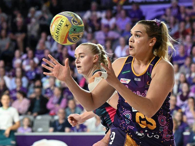 Donnell Wallam starred for the Queensland Firebirds in a 76-71 win over the Melbourne Vixens. (Darren England/AAP PHOTOS)