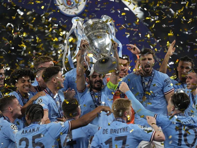 Captain Ilkay Gundogan holds up the trophy after Manchester City won the Champions League final. (AP PHOTO)