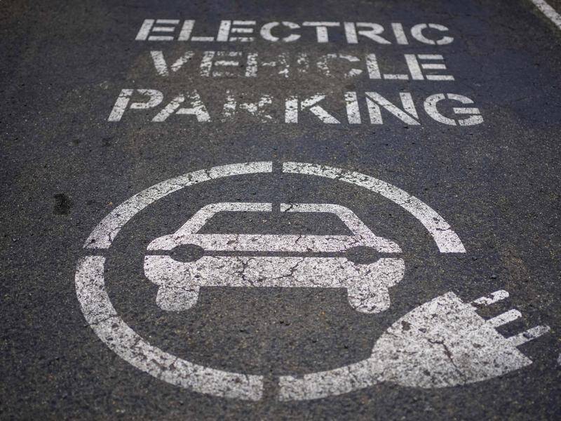 Unit owners could see their home value drop if they do not add electric car chargers, experts warn. (AP PHOTO)